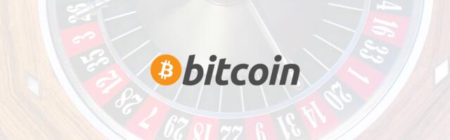 Bitcoin logo met een roulette-tafel op de achtergrond