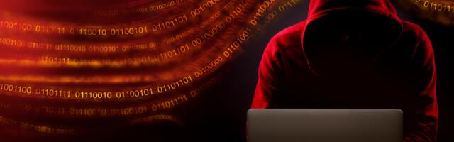 Anonieme hacker achter computer
