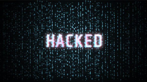 Binary code met het woord hacked