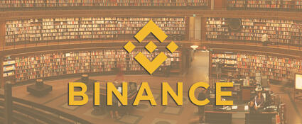 Binance logo met universiteit op de achtergrond