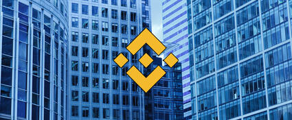 Binance logo met gebouwen op de achtergrond