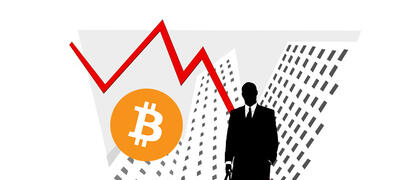 Bitcoin zit in een neerwaartse trend en een handelaar staat erbij